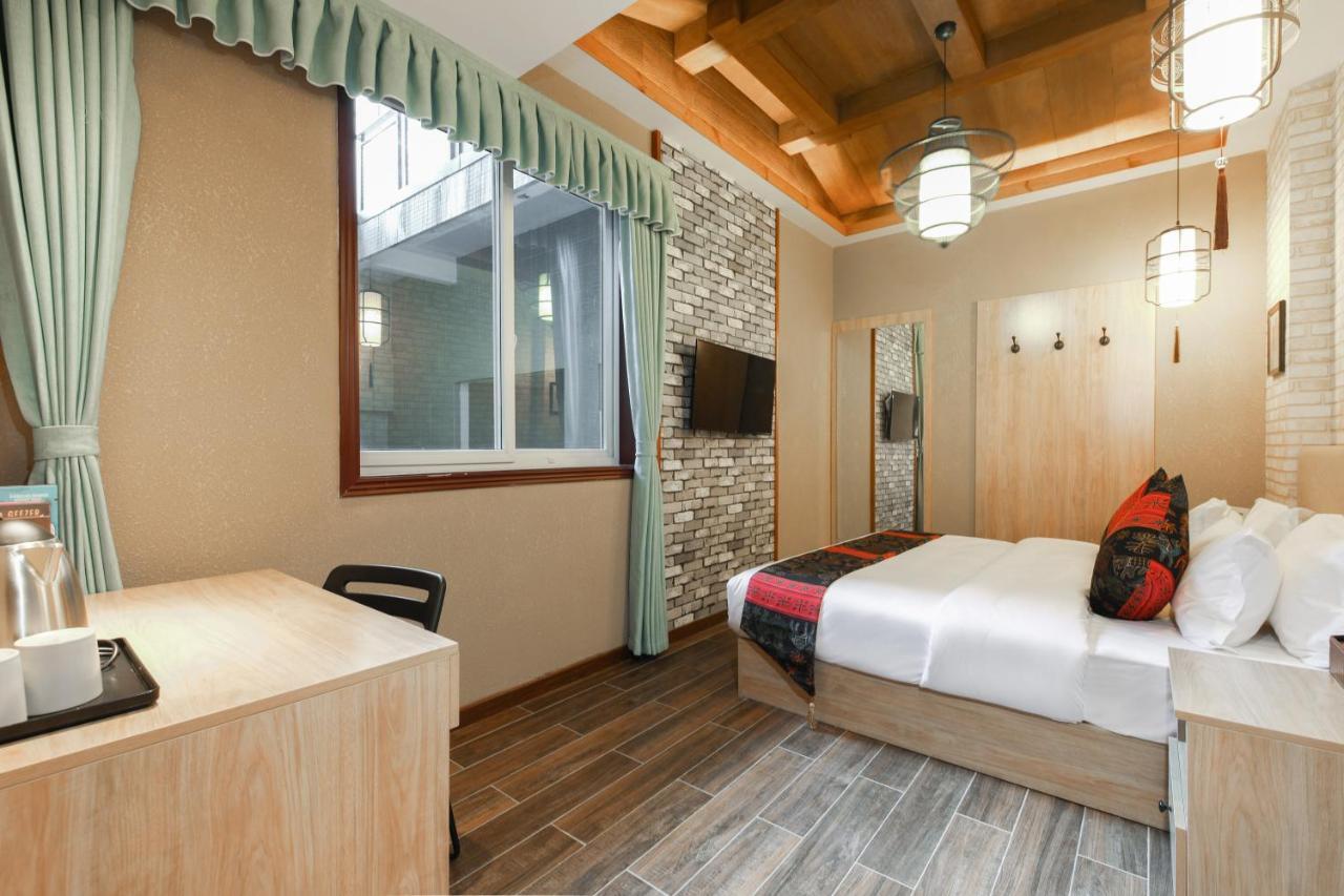 Zou Qu Ye Travel Hotel Chongqing Exterior foto